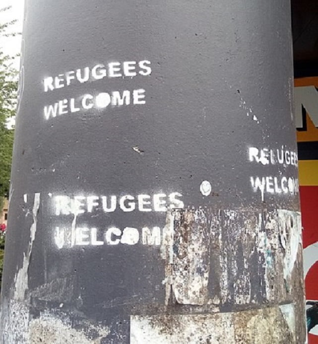 This image has an empty alt attribute; its file name is 432px-Refugees_welcome_graffiti_Groningen_2019_01-1.jpg
