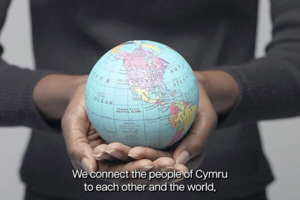 globe being held in hands